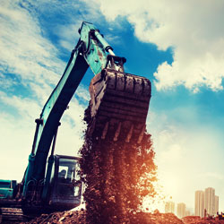Offroad excavator in the sun